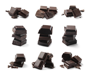 Set with pieces of dark chocolate on white background
