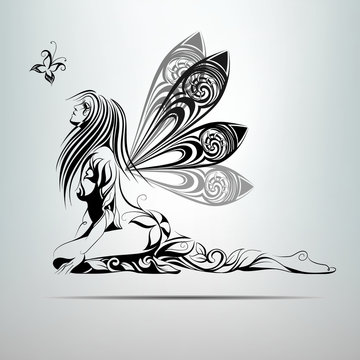 Vector silhouette of a fairy with decorative wings