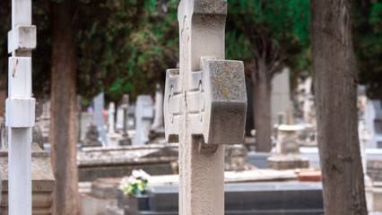 STONE CROSSES IN A CEMETERY