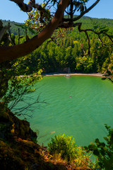 Sailboat in Inati Bay Located in the Salish Sea, Washington. A lovely sheltered bay found on Lummi Island surrounded by an evergreen forest. 