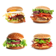 Set of different delicious burgers on white background