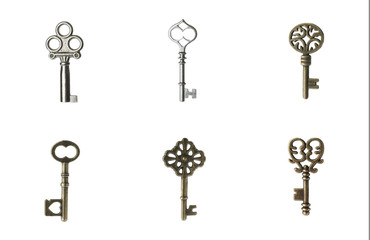 Set of different ornate keys on white background