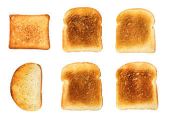 Set with toasted slices of wheat bread on white background, top view