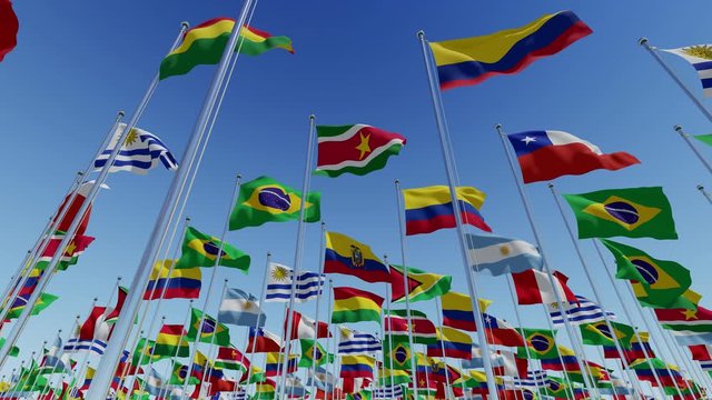 South America continent flags. Various world flags flying on flagpoles against blue sky. 3d rendering animation.