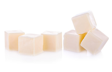 Cheese cubes isolated on white background
