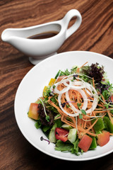 fresh organic mixed vegetable vegan Garden Salad with Vinaigrette sauce