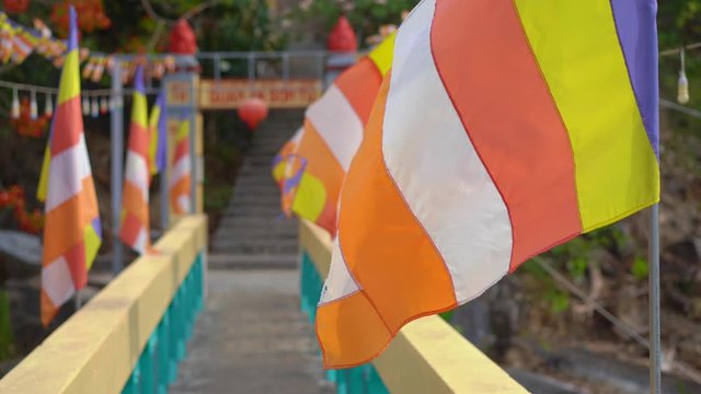 Colourful flags in a buddhist temple in Asia