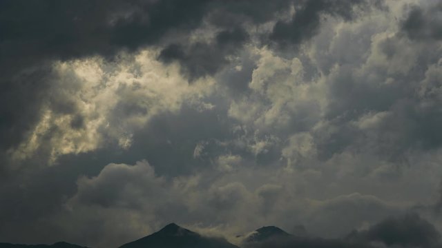 Timelapse of dramatic clouds in an alpine valley