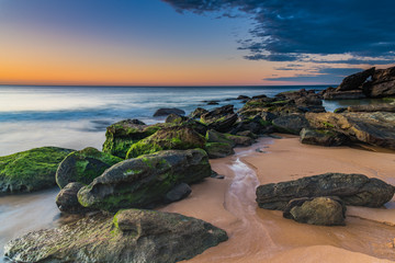 Rocky Sunrise Seascape at the Beach