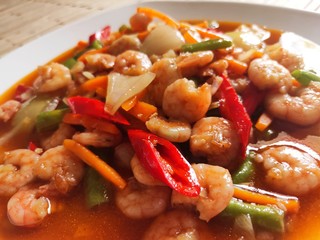 Sweet and sour shrimp on White Plate. Selective Focus