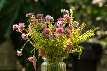 gerbera flowers in vase adorned in beautiful colors vintage used as background