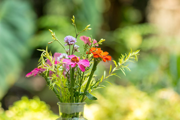 gerbera flowers in vase adorned in beautiful colors vintage used as background