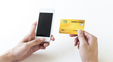 Men use smart phone to register online purchases using credit card payments, Convenience in the world of technology and the internet, Shopping online and banking online concept.