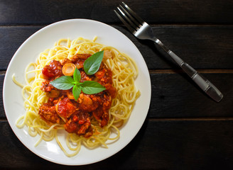 Chicken Spaghetti Tomato Sauce on Dark Background