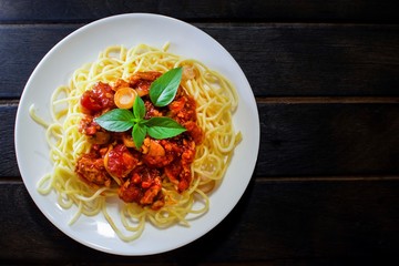 Chicken Spaghetti Tomato Sauce on Dark Background