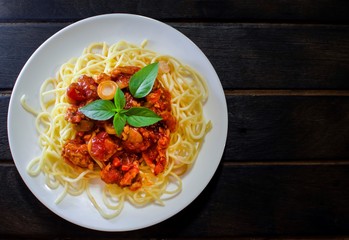 Chicken Spaghetti Tomato Sauce on Dark Background
