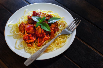 Chicken Spaghetti Tomato Sauce on Dark Background