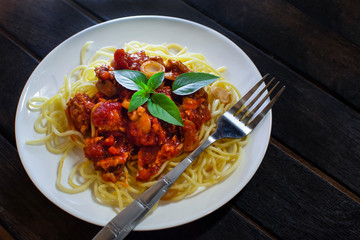 Chicken Spaghetti Tomato Sauce on Dark Background