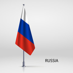 Russia hanging flag on flagpole