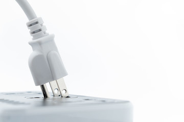 Ready to connect. Plugging electrical, black plug in electric socket