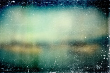 Vintage old abstract blurred retro photo bokeh background with scratches and defects