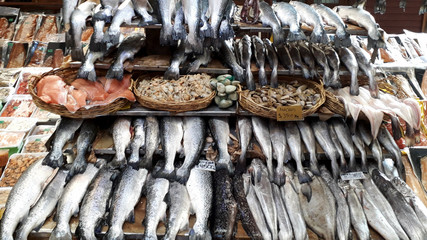 close up of a pile of fish plates