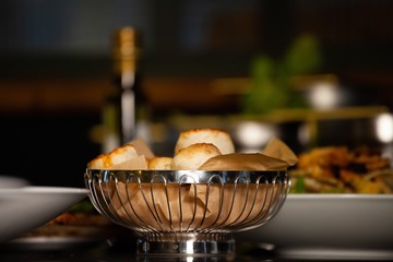basket of pizza rolls in restaurant