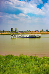 A beautiful view of boat in Mekong river at Phnom Penh, Cambodia.