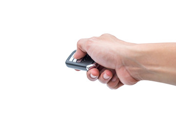 Young woman opening her luxurious car door the modern control remote keys isolated on white background. Hand is locking the automobile with the security system.