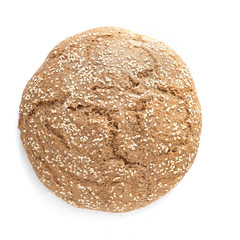 Homemade whole grain round bread isolated on a white background.