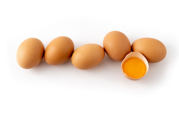 fresh brown chicken eggs isolated on white background