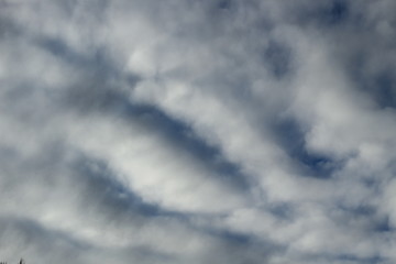 wave of clouds in clear sky one morning