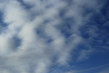 wave of clouds in clear sky one morning