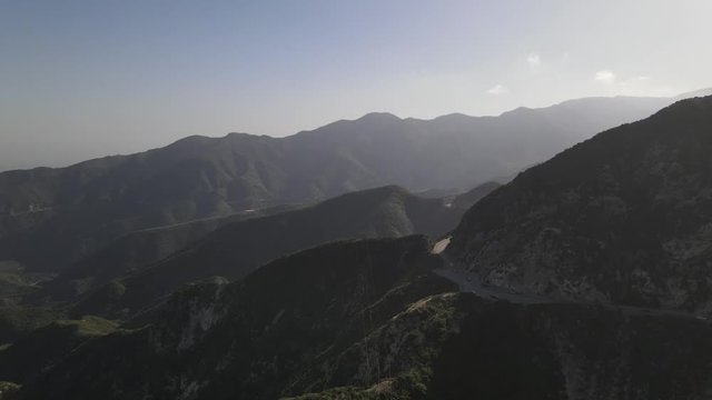 Ariel shots of Angeles National Forest, flying though mountains, panoramic landscapes, sunset