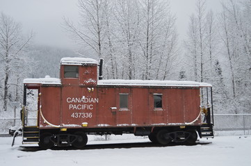 Red Historical Old Ancient Canadian Pacific Train Car in White Snow in Canada