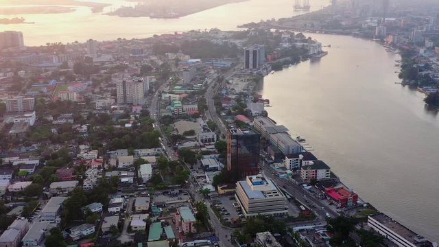 Panning shot of Sunset over Victoria Island, Lagos, Nigeria with Five Cowries Creek and Lagos Lagoon in view.