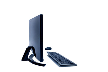 Blank computer screen in office room for copy space. Modern flat screen monitor. Personal computer...