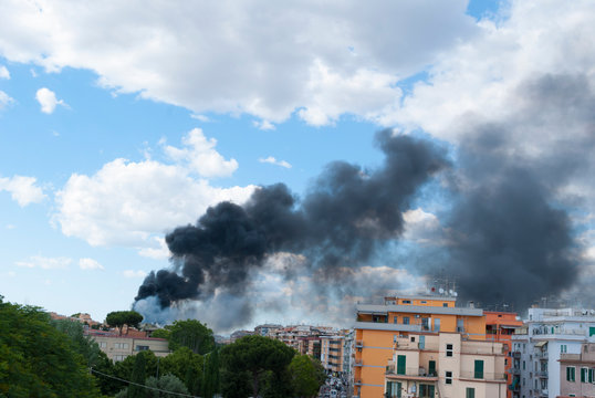 Black smoke caused by a fire in the Centocelle district of Rome

