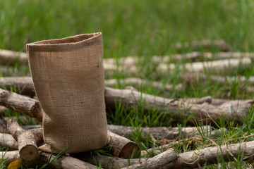 Sacks lay on the green grass