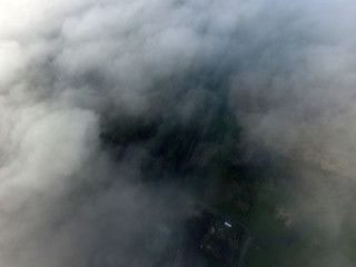Aerial view saburb landscape (drone image). with the morning fog. Near Kiev 
