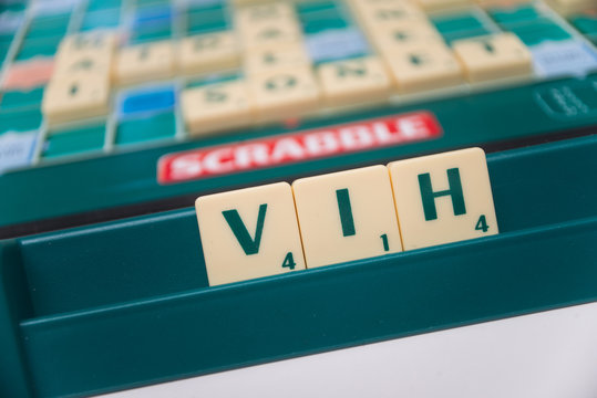 Mulhouse - France - 27 May 2020 -Closeup of word forming with Scrabble game letters -  VIH