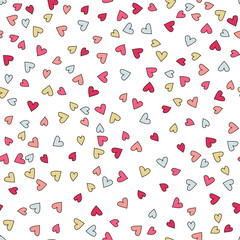 Seamless background pattern with hearts.