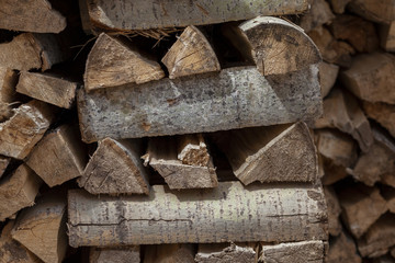 a pile of chopped wood. Woodpile with firewood