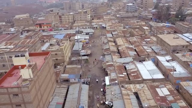 Moving aerial 4K drone footage of Dandora Slum, Nairobi Kenya