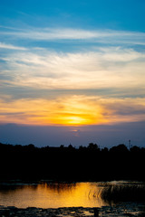 sunset with gold reflaction on water