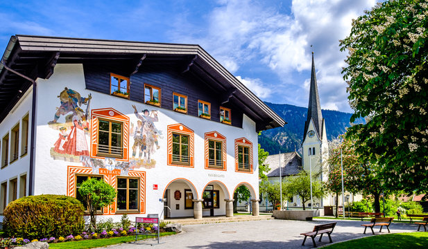 Bayrischzell, Germany - May, 19: old bavarian buildings and church at the old town of Bayrischzell on May 19, 2020
