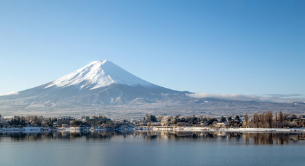 Mt. Fuji with red pagoda in winter, Fujiyoshida, Japan