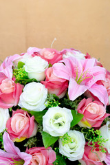 bouquet of roses and brown background