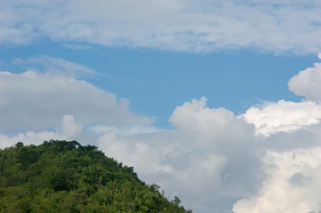 green hill with blue sky and cloud
