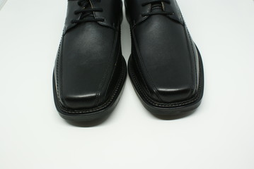 Elegant Black Leather Shoes on white background
